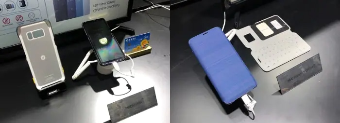 展示的 NFC 非接触式销售终端 (POS) 支付技术（左）和非接触式电能传输（右）展示