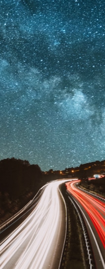 Highway under the starry sky.