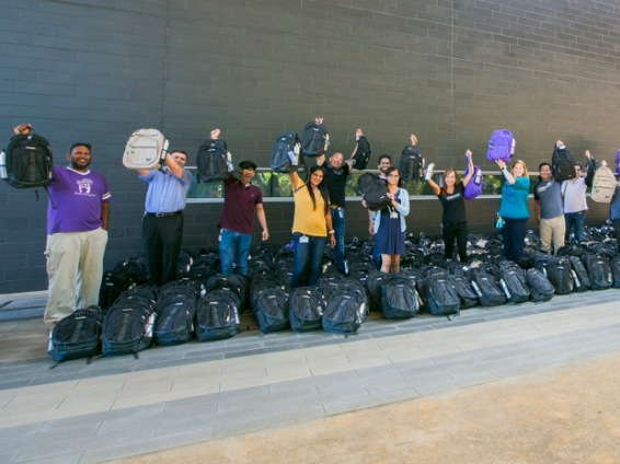 an image of people holding bags