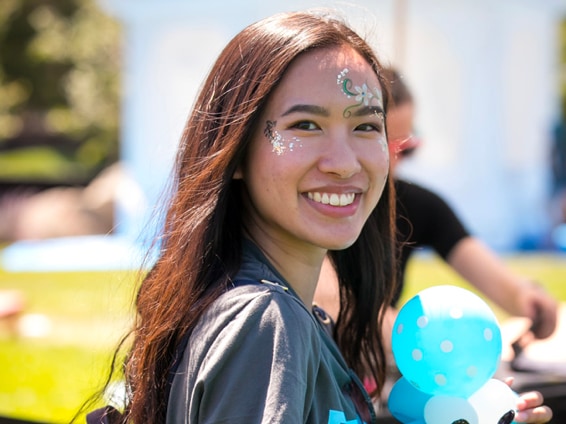an image of a woman with face painting