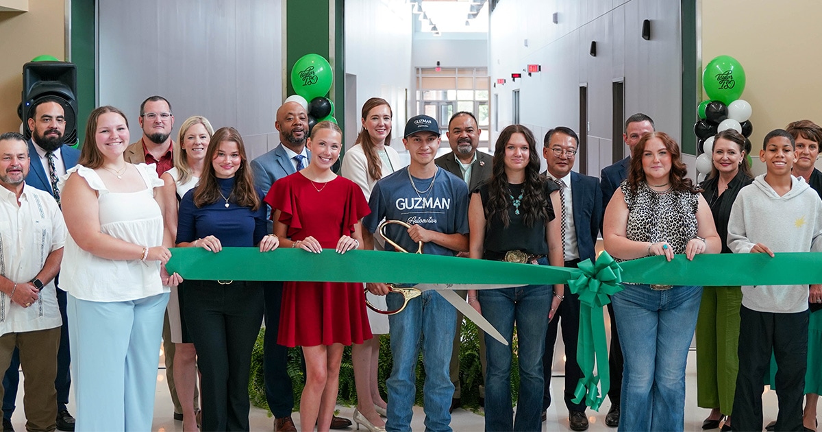 Taylor ISD students and staff, elected officials and Samsung Austin Semiconductor executives at the ribbon cutting ceremony on June 12, 2025.
