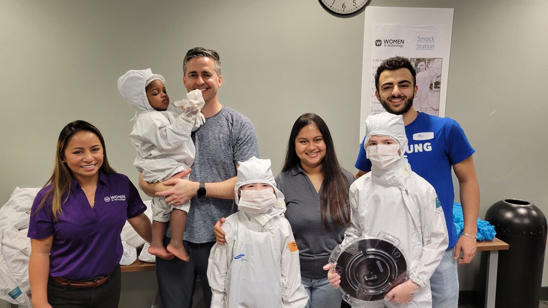 Samsung Austin Semiconductor director Zac Rosenbaum with his children and colleagues.