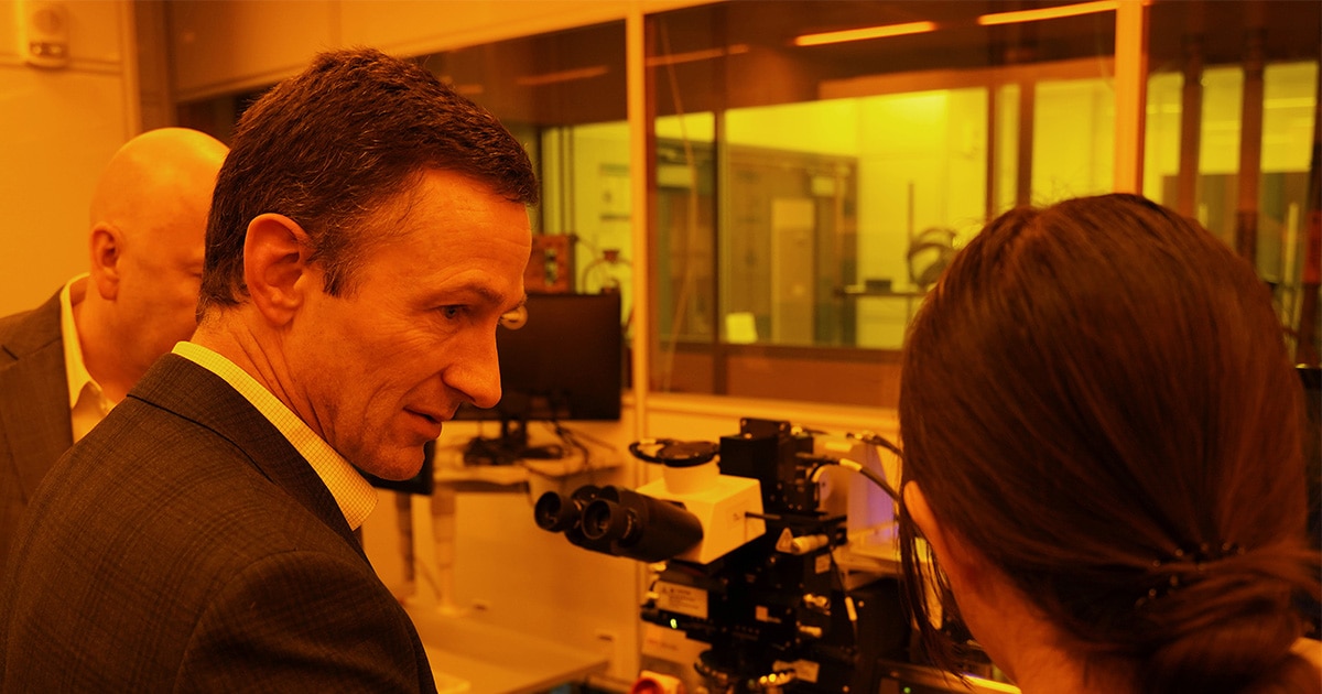 Samsung Austin Semiconductor Executive Vice President Jon Taylor visiting The University of Texas at Austin’s cleanroom in 2024.