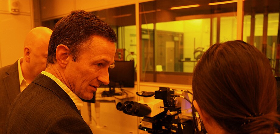 Samsung Austin Semiconductor Executive Vice President Jon Taylor visiting The University of Texas at Austin’s cleanroom in 2024.