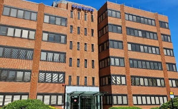 A front view of Samsung’s London facility, featuring traditional brick architecture with modern office windows.