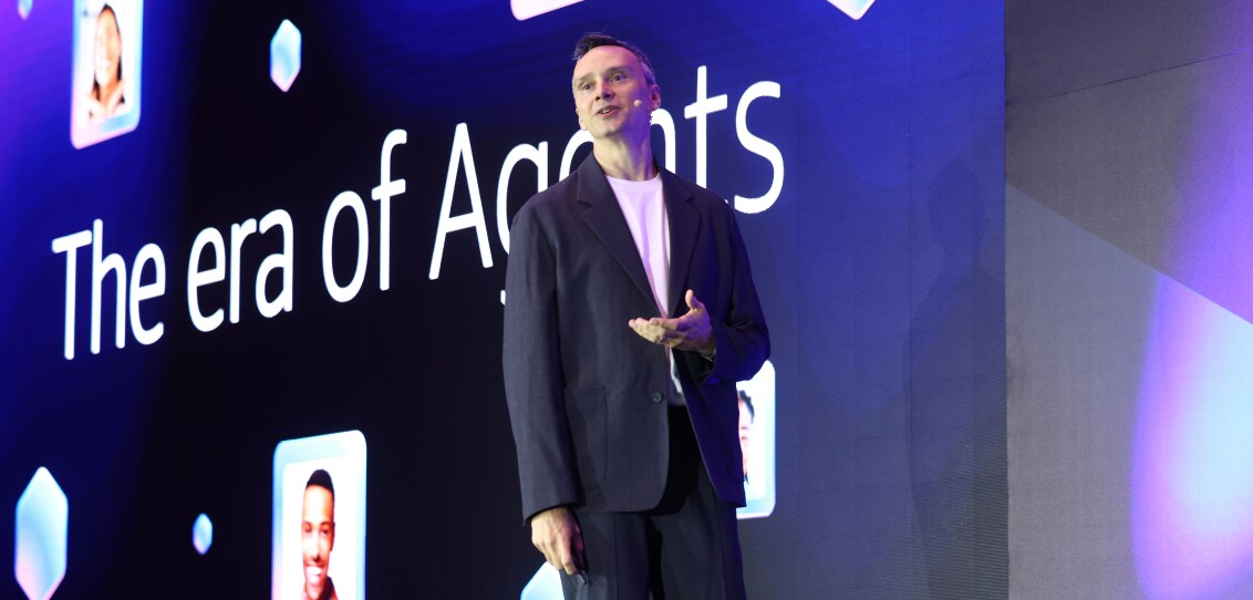 David Green, AI Technology Leader, presenting on AI agents on stage