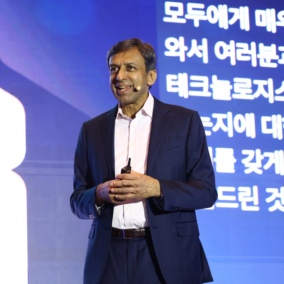 Ajaz Munsiff, CDO, presenting an AI-native enterprise strategy on stage