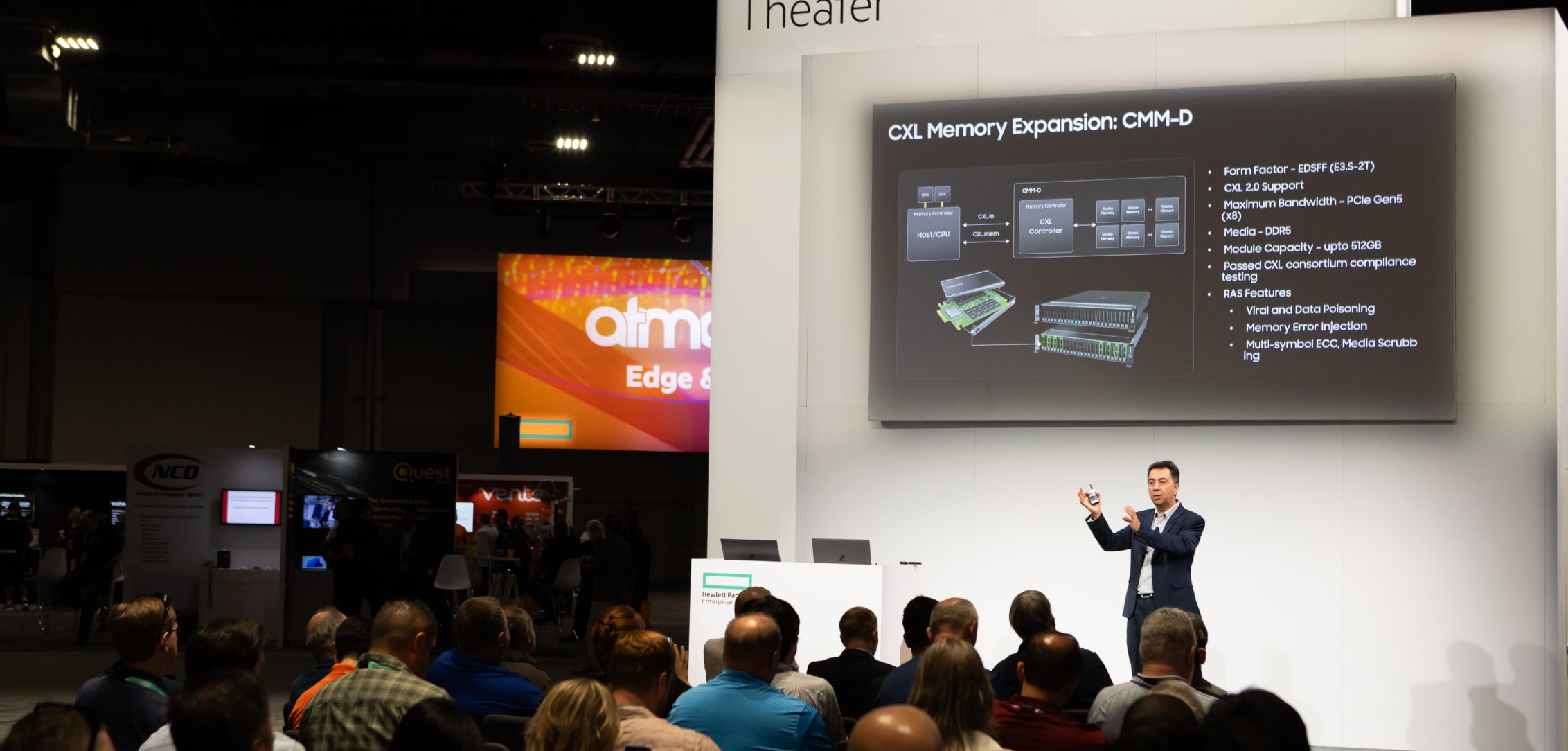 A speaker presenting on CXL Memory Expansion at the Edge & Networking Theater, detailing the features and benefits of CMM-D technology to attendees.