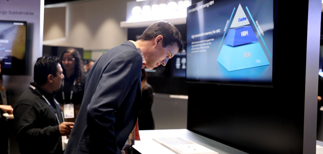 A person closely examining a digital display at NVIDIA GTC 2024