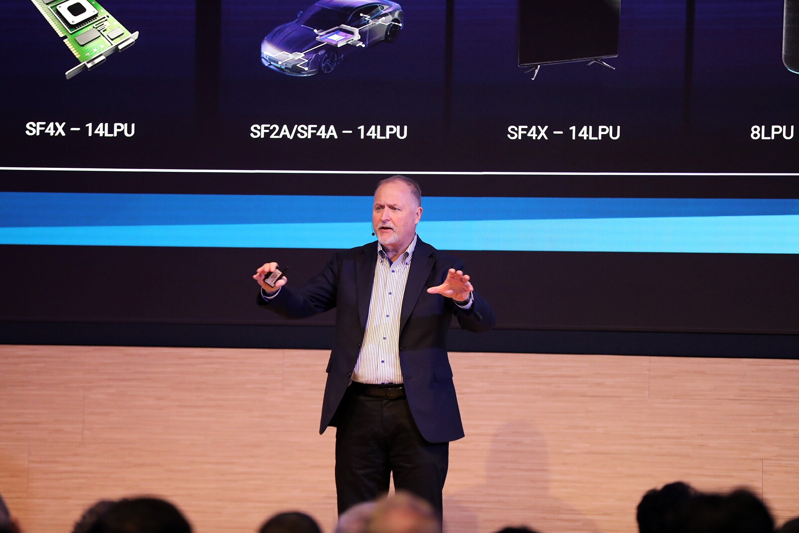 John Koeter, Senior Vice President at Synopsys, delivers a keynote presentation at the SAFE™ Forum 2025, standing before a screen showcasing advanced semiconductor nodes.