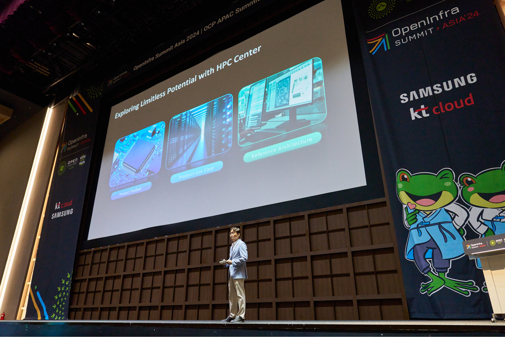 A speaker presents on stage at the Open Compute Project (OCP), with a large screen displaying high-performance computing (HPC) center concepts.