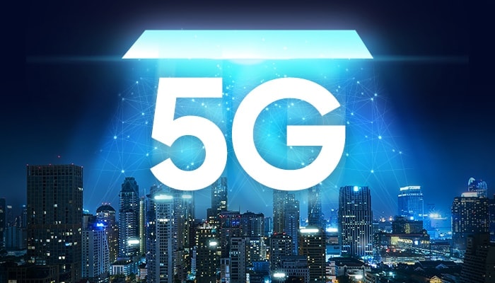 Along with the view of the city, you can see the 5G logo. On top of the logo, dotted lines symbolizing Connectivity are brightly surrounding 5G.