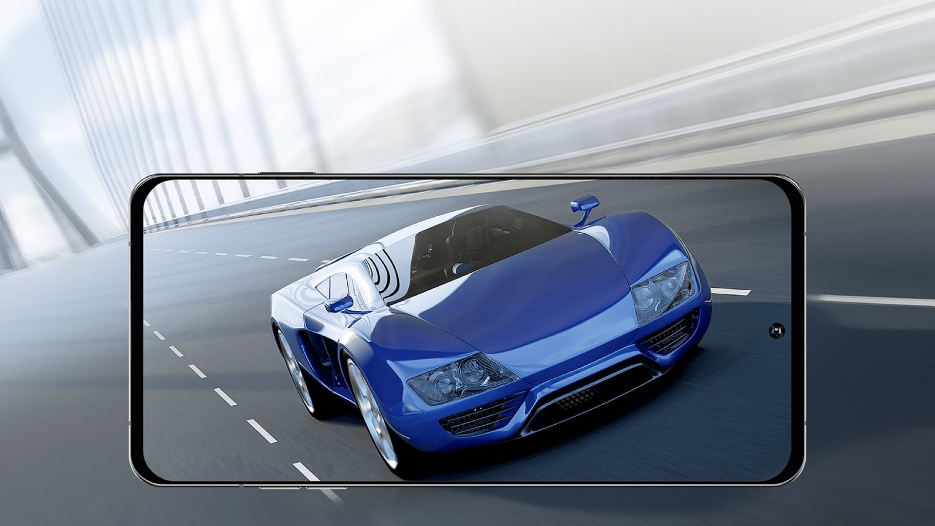 a blue sports car driving down a highway to represent fast display refresh rate thanks to the Exynos 1380